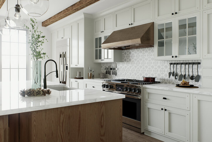 a modern kitchen with marble worktops